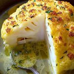 Whole roasted cauliflower with butter sauce