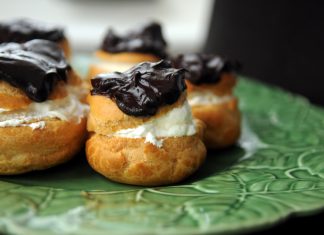 Cream Puffs with Whipped Cream and a Chocolate