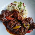 Oxtail served with mash potatoes