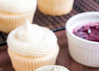 Almond Wedding Cake Cupcakes with Raspberry Filling