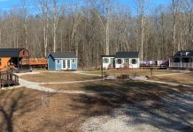 A family builds a village of small houses where each of the four members has his own house.