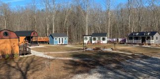 A family builds a village of small houses where each of the four members has his own house.