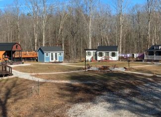 A family builds a village of small houses where each of the four members has his own house.