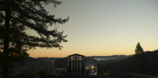 Family Builds Two Tiny Homes Connected By A Sunroom