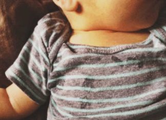 Baby Onesies Are Actually Designed To Help Parents Handle Diaper Catastrophes