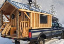 Man Builds Tiny Log Cabin Onto The Bed Of His 1996 Ford F-350