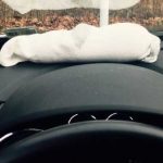 How do you defog a windscreen with kitty litter and a sock?