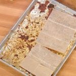 Clean the grime from your baking sheets with dryer sheets