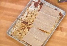 Clean the grime from your baking sheets with dryer sheets