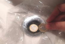 Why he placed a bag over the drain of his hotel bathtub.