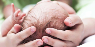 A mother gives birth to twins from different fathers