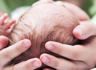 A mother gives birth to twins from different fathers