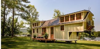Charming Timbercraft tiny house is surprisingly spacious.