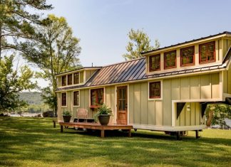 Charming Timbercraft tiny house is surprisingly spacious.