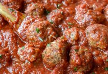 Savory Baked Meatballs with Herb-Infused Marinara