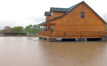 Man Builds Dream Home Over A Pond So He Can Fish From A Hole In His Living Room Floor
