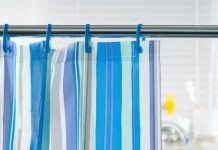 The Right Way to Clean a Shower Curtain, According to Pros From Molly Maid and DeluxeMaid