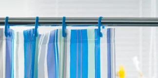 The Right Way to Clean a Shower Curtain, According to Pros From Molly Maid and DeluxeMaid