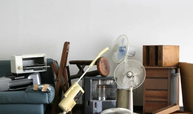 13 Items You Should Never Put in a Dumpster When Cleaning Out Your Home