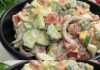 sliced tomatoes and cucumbers marinated in olive oil