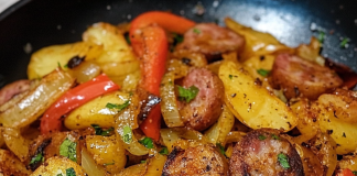 Sizzling Skillet: Fried Potatoes and Onions/Peppers with Smoked Sausage – A Flavorful Feast!
