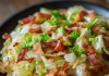 Savory Sensation: Fried Cabbage with Bacon, Onion, and Garlic – Flavor in Every Bite!