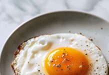 My mother-in-law and I can’t agree on what’s an over easy egg. I think this is over easy but she doesn’t. Thoughts?