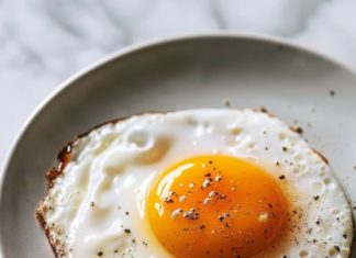 My mother-in-law and I can’t agree on what’s an over easy egg. I think this is over easy but she doesn’t. Thoughts?