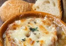 Soup made with onions and typically served with melted cheese on top.
