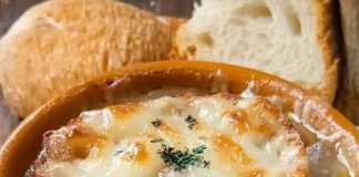 Soup made with onions and typically served with melted cheese on top.