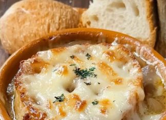 Soup made with onions and typically served with melted cheese on top.
