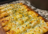 Delight in the Flavor: Homemade Cheesy Garlic Breadsticks That Will Steal the Show!