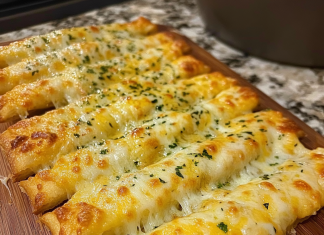 Delight in the Flavor: Homemade Cheesy Garlic Breadsticks That Will Steal the Show!