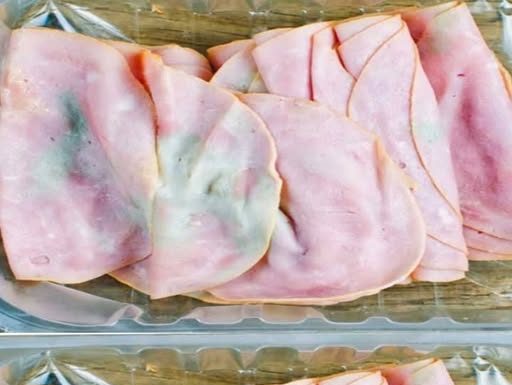 Pulled out some deli meat from fridge. My mother-in-law says it’s wasteful not to use it, but it looks bad to me. What should I do?