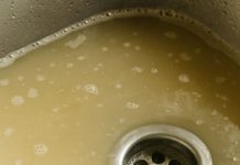 My kitchen sink takes forever to drain, and I’m hosting dinner soon — what can I safely try first?