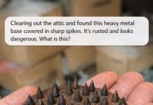 Clearing out the attic and found this heavy metal base covered in sharp spikes. It’s rusted and looks dangerous. What is this?