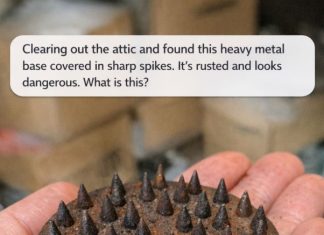 Clearing out the attic and found this heavy metal base covered in sharp spikes. It’s rusted and looks dangerous. What is this?