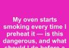 My oven starts smoking every time I preheat it — is this dangerous, and what should I do before a service appointment?