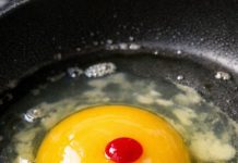 Why is there a gross red spot floating inside my raw egg?