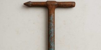 Found a metal bar on my driveway. Any idea what it could be?