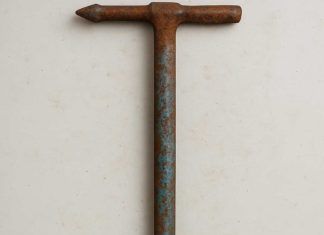 Found a metal bar on my driveway. Any idea what it could be?