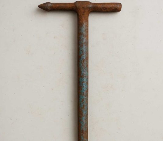 Found a metal bar on my driveway. Any idea what it could be?