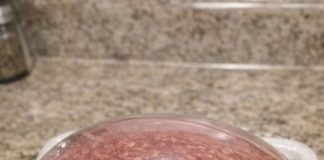 I just bought this pack of ground beef from the store yesterday and put it in the fridge. I went to cook dinner and noticed the plastic film is puffed up like a balloon, but the date is still good. Wh