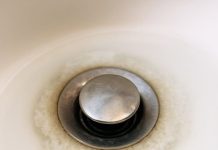 My bathroom sink has been draining slower by the day, and plumbers are fully booked until after Christmas. What can I try first?