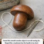 Found this smooth wooden object in an old sewing tin. Shaped like a mushroom but the handle is too short to be a pestle.