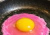 I cracked an egg and the liquid is a neon pearlescent pink — is this safe?