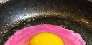 I cracked an egg and the liquid is a neon pearlescent pink — is this safe?