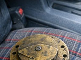 Picked this up at a muddy March flea market for two dollars. It has numbered notches and a rotating top plate, but no obvious way to attach it to anything. What is this thing?