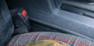 Picked this up at a muddy March flea market for two dollars. It has numbered notches and a rotating top plate, but no obvious way to attach it to anything. What is this thing?