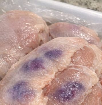 Thawed chicken breasts and noticed purple blotches under the skin. Safe to cook or throw out